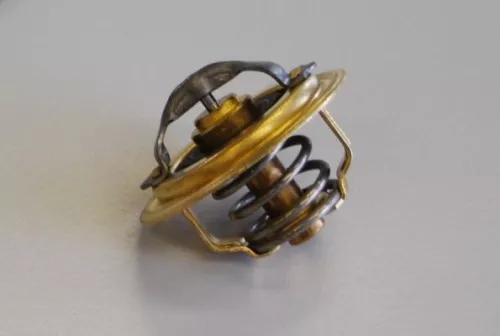 Thermostat, coolant